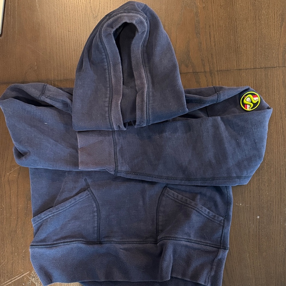 Vintage Lululemon- Navy Blue Hoodie with Patch and front pockets. XS